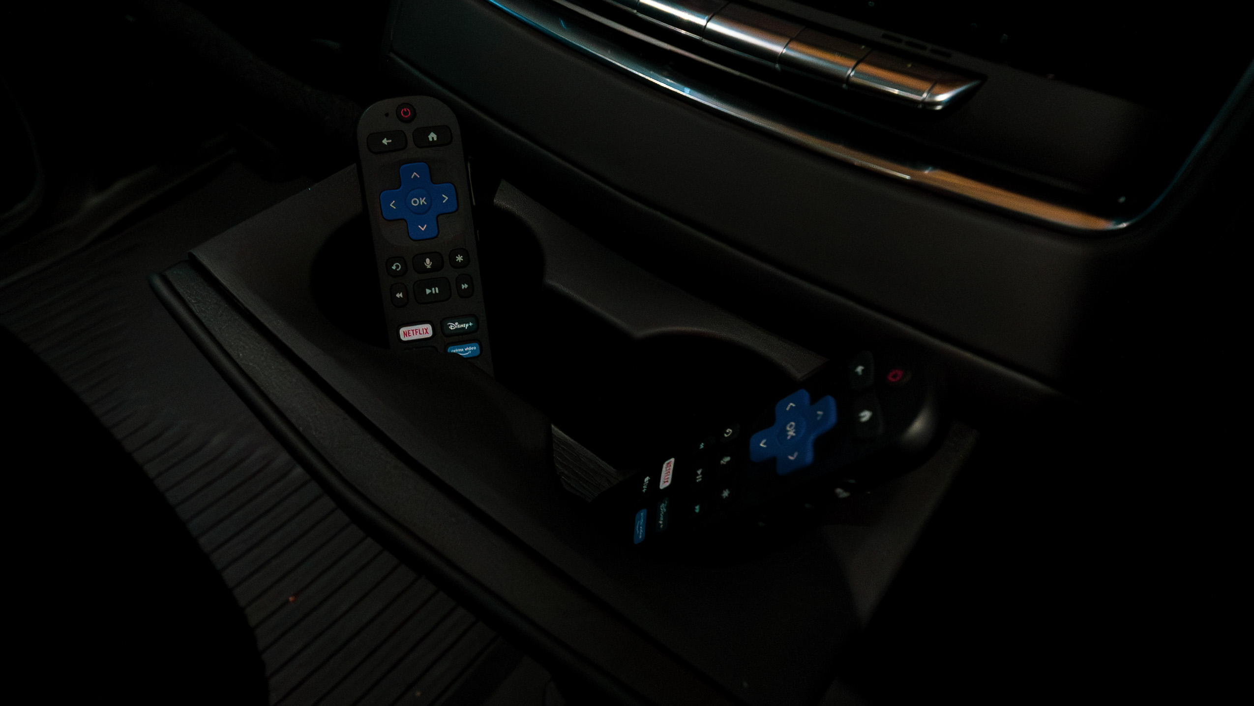 Center console with streaming entertainment remotes